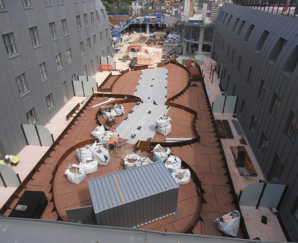 completed custom steel garden edging at Islington Square